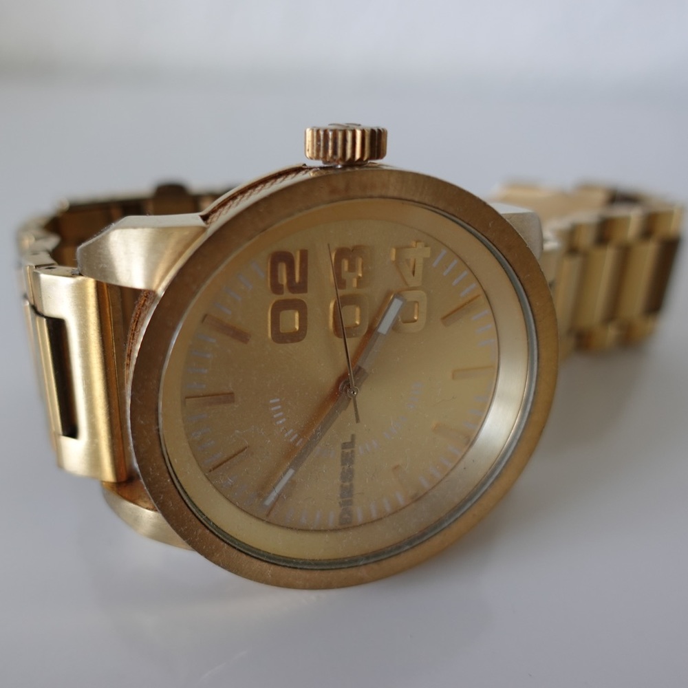 Diesel men’s big face gold tone watch